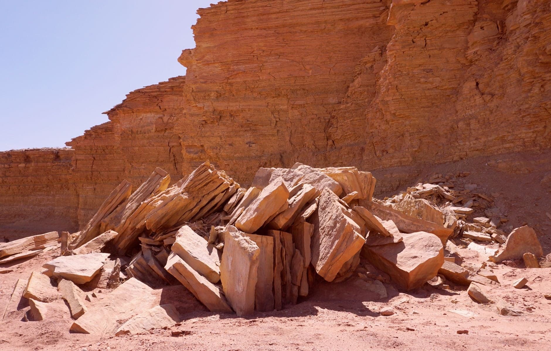 An asteroid struck somewhere north of Australia 11 million years ago, scattering molten glass across a 900-kilometre ellipse in South Australia — yet scientists still cannot find the crater it left be