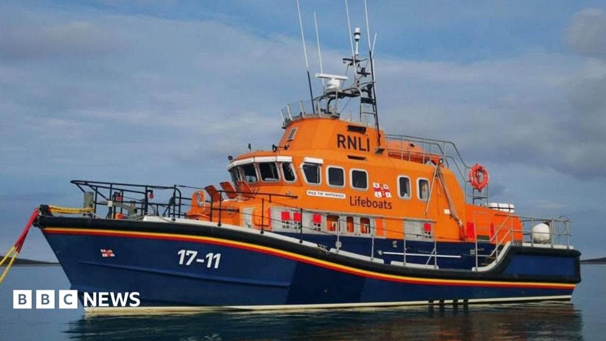 Crew taken to safety after 60ft motorboat fire